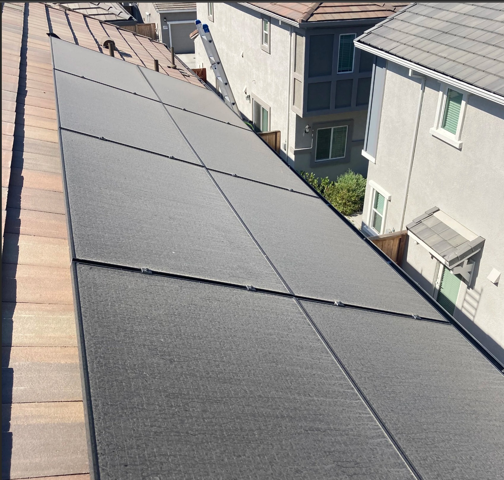 Dirty solar panels covered in dust and grime in Hemet, California before professional cleaning